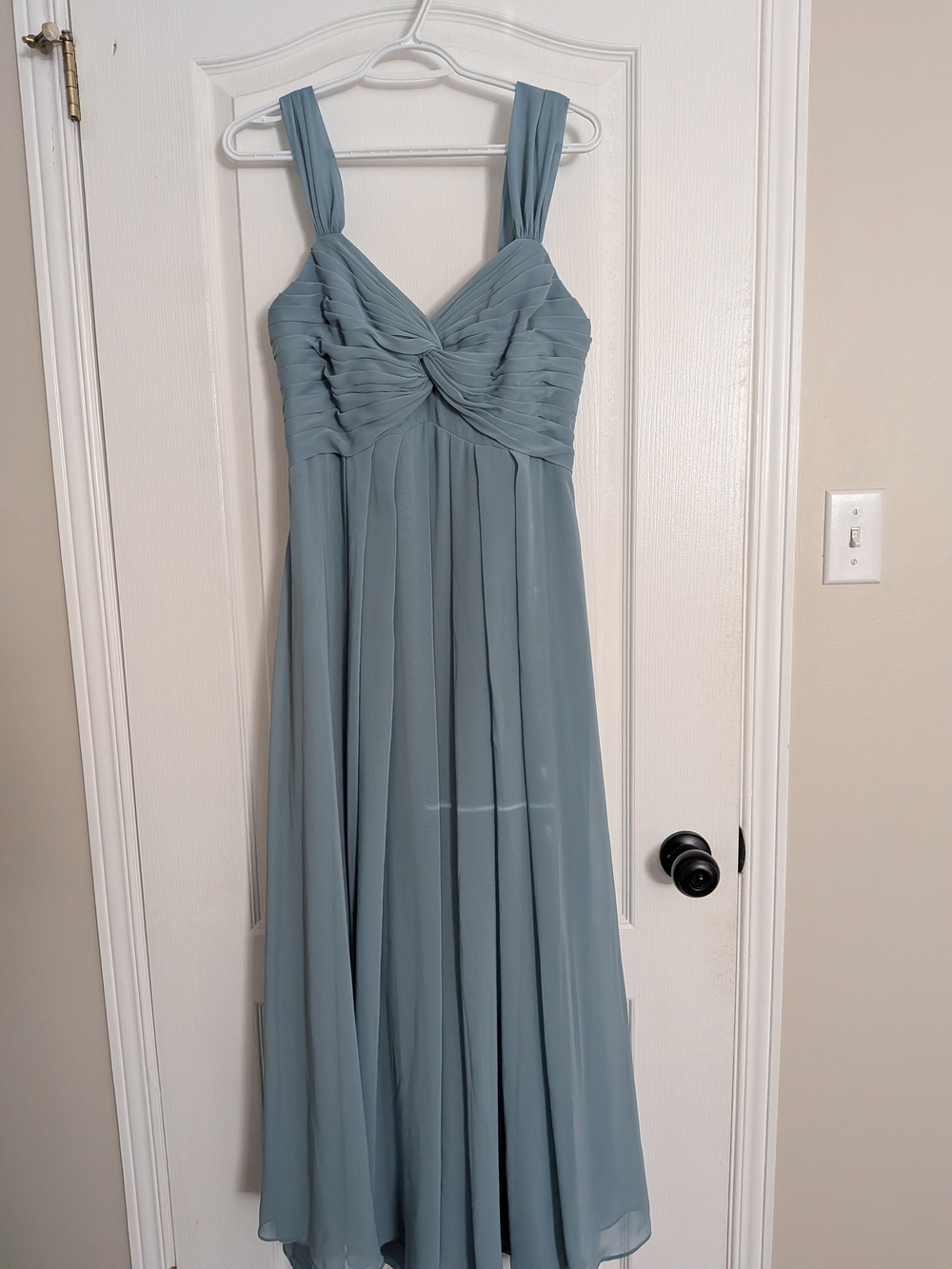 Elegant Sleeveless Blue-Green Maxi Dress with Twisted Bodice